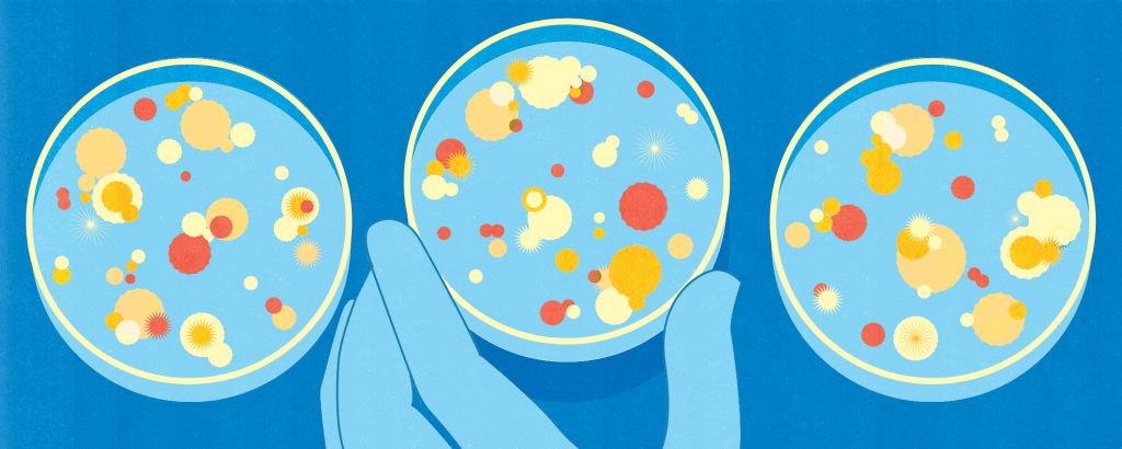 Graphic of a hand holding a petri dish