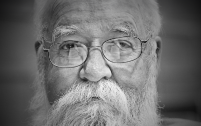A black and white photo of Daniel Dennett